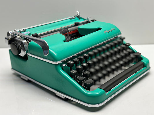 Olympia SM3 Typewriter with Turquoise Bag - A Harmonious Blend of Classic and Contemporary