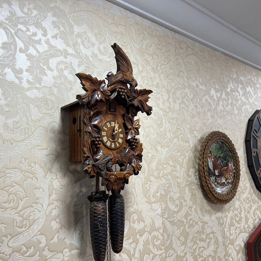Exquisite Antique German Cuckoo Clock - Collector's Edition with Intricate Carvings and Fox Design