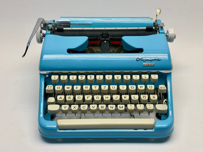 Blue Olympia Monica Typewriter - 1960 Model, Excellent Condition - White Keyboard, with or without Bag