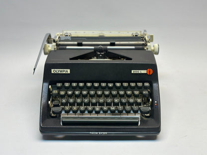 Embrace Timeless Craftsmanship with the Olympia Typewriter - Black Body, Leather Bag, Antique Charm