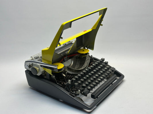 Capture Vintage Splendor with the Yellow Olympia Monica Typewriter - Black Keyboard, Antique 1960 Model- AZERTY KEYBOARD