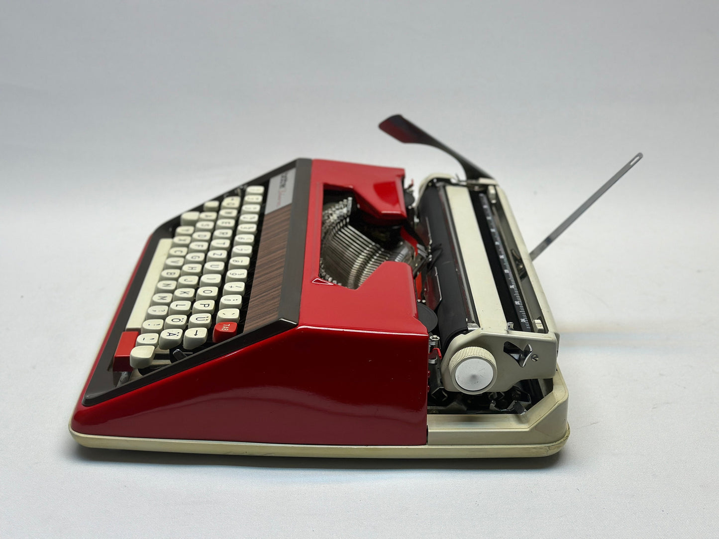Embrace Vintage Luxury with the Brother Deluxe Typewriter - Red Body, White Bag, Antique Elegance