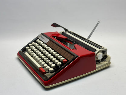 Embrace Vintage Luxury with the Brother Deluxe Typewriter - Red Body, White Bag, Antique Elegance