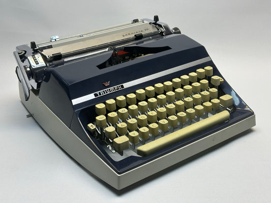 German-Made Navy Blue Triumph Typewriter w/ Cream Accents, QWERTZ Keyboard, European Craftsmanship, Leather Bag - Vintage Typewriter