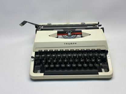 Embark on a Journey Through Time with the Triumph Typewriter - Vintage White Elegance, Black QWERTZ Keyboard, Antique Gift
