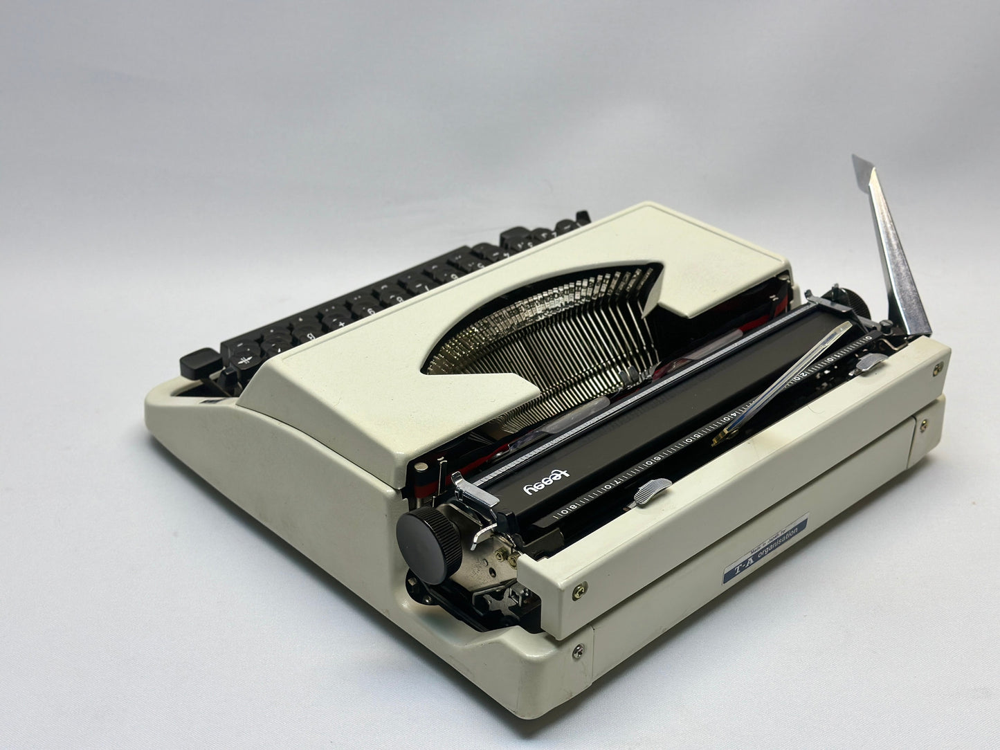 Embark on a Journey Through Time with the Triumph Typewriter - Vintage White Elegance, Black QWERTZ Keyboard, Antique Gift