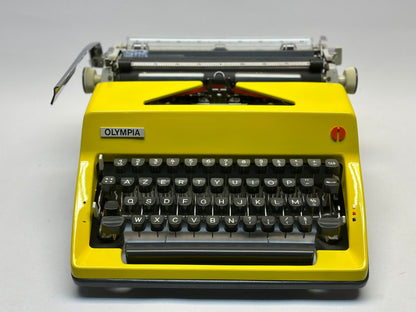 Capture Vintage Splendor with the Yellow Olympia Monica Typewriter - Black Keyboard, Antique 1960 Model- AZERTY KEYBOARD
