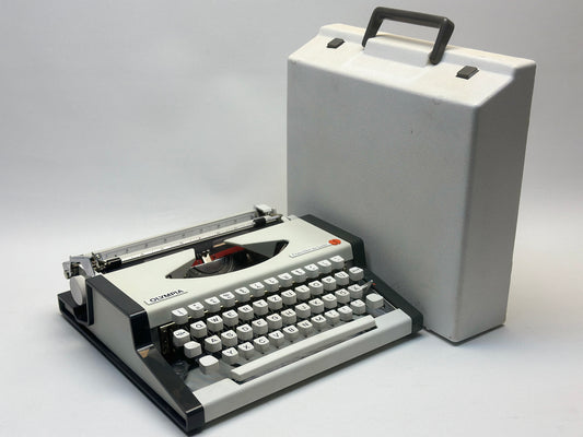 Capture Vintage Elegance with the Olympia Traveller Typewriter - German-Made, QWERTZ Keyboard