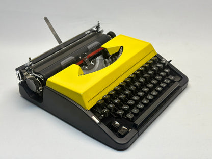 German-Made Adler Triumph Typewriter with QWERTZ Keyboard, Yellow Cover, Black Keys - Antique Beauty, Fully Functional Manual Typewriter