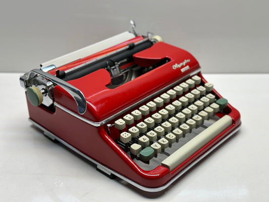 Olympia SM5 Monica Typewriter - 1960 Model, Red Body, White Keys, Dual-Color Capability, Pristine Case