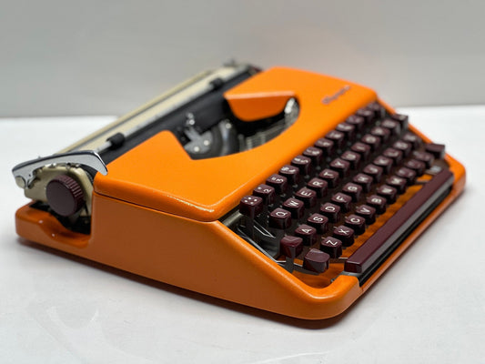 Olympia Splendid 33/66 Typewriter - QWERTY Keyboard, Burgundy Keys, Orange Typewriter, and Matching Bag